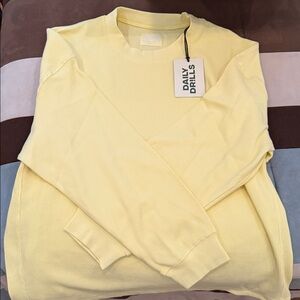Daily Drills Oversized Sport Thermal- Lemonade W/ Monochrome Patch
Size XS/S NWT